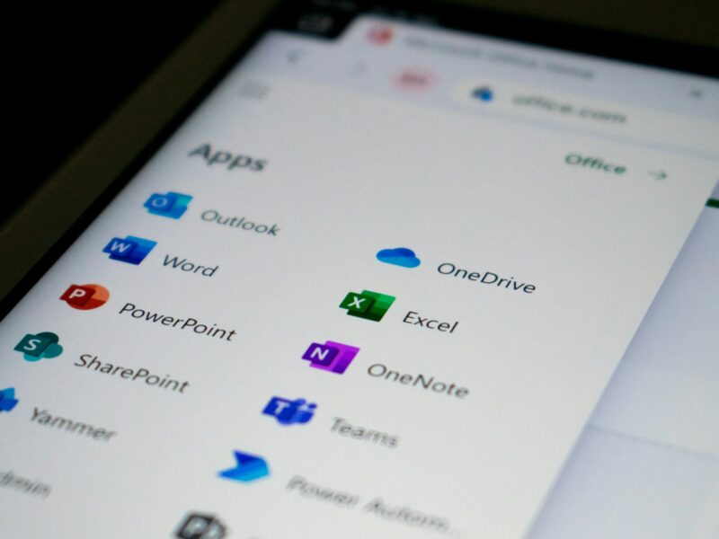 The Microsoft 365 app launcher listing Outlook, Word, Excel, Teams and OneDrive